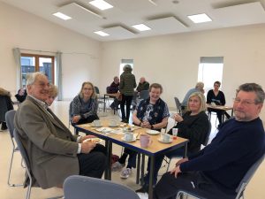 Image of group enjoying the coffee morning